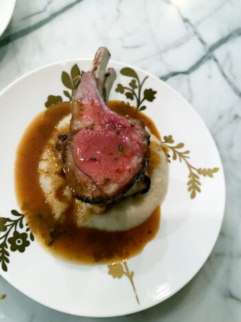 Rack of elk with celery root potato puree, shallot thyme Madeira sauce. Learn to cook perfect wild game with a hands on cooking class with Chef Greg Montana - shallot thyme Madeira sauce