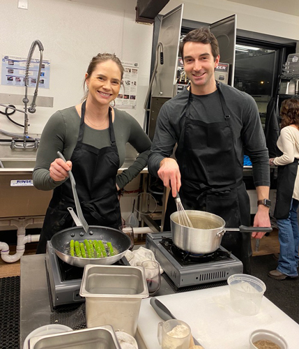 Katie Mariani and Nick Pavle couple enjoying a Valentine's Day pasta making class with Chef Greg Montana in Bozeman, MT